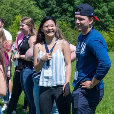 U N E students having fun at an outdoor Orientation event