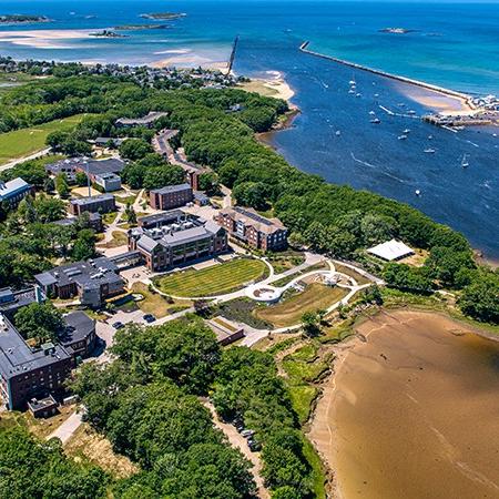 An aerial photo showing part of the Biddeford Campus and the Atlantic Ocean